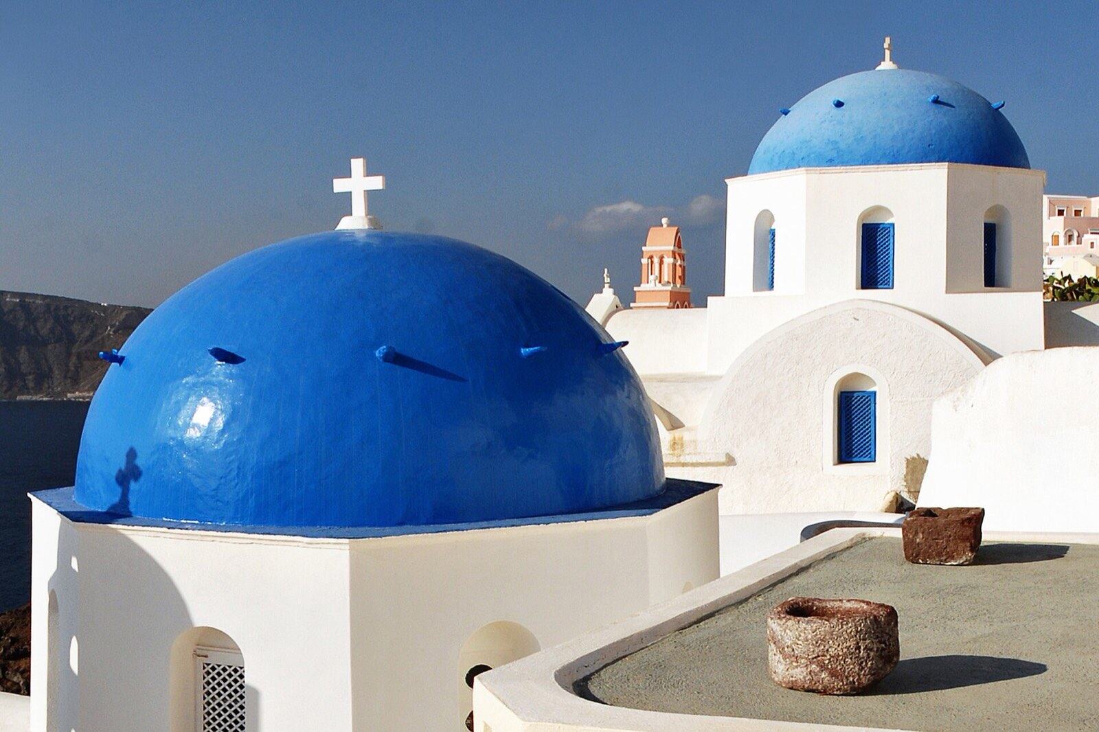 Reknown blue domes of the Church dedicated to St. Spirou in Firostefani, Santorini island 